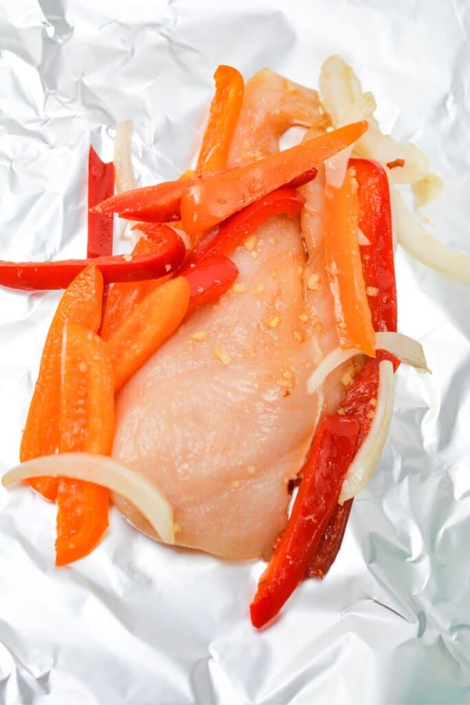 Chicken and veggies in foil.
