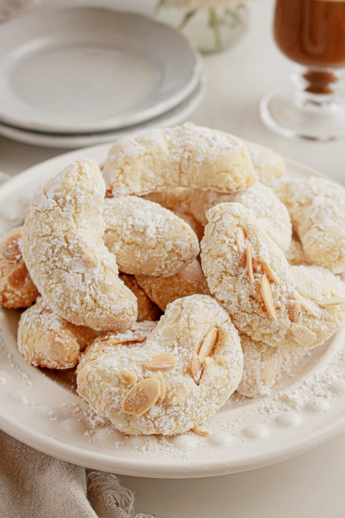 Italian amaretti cookies on a white plate.