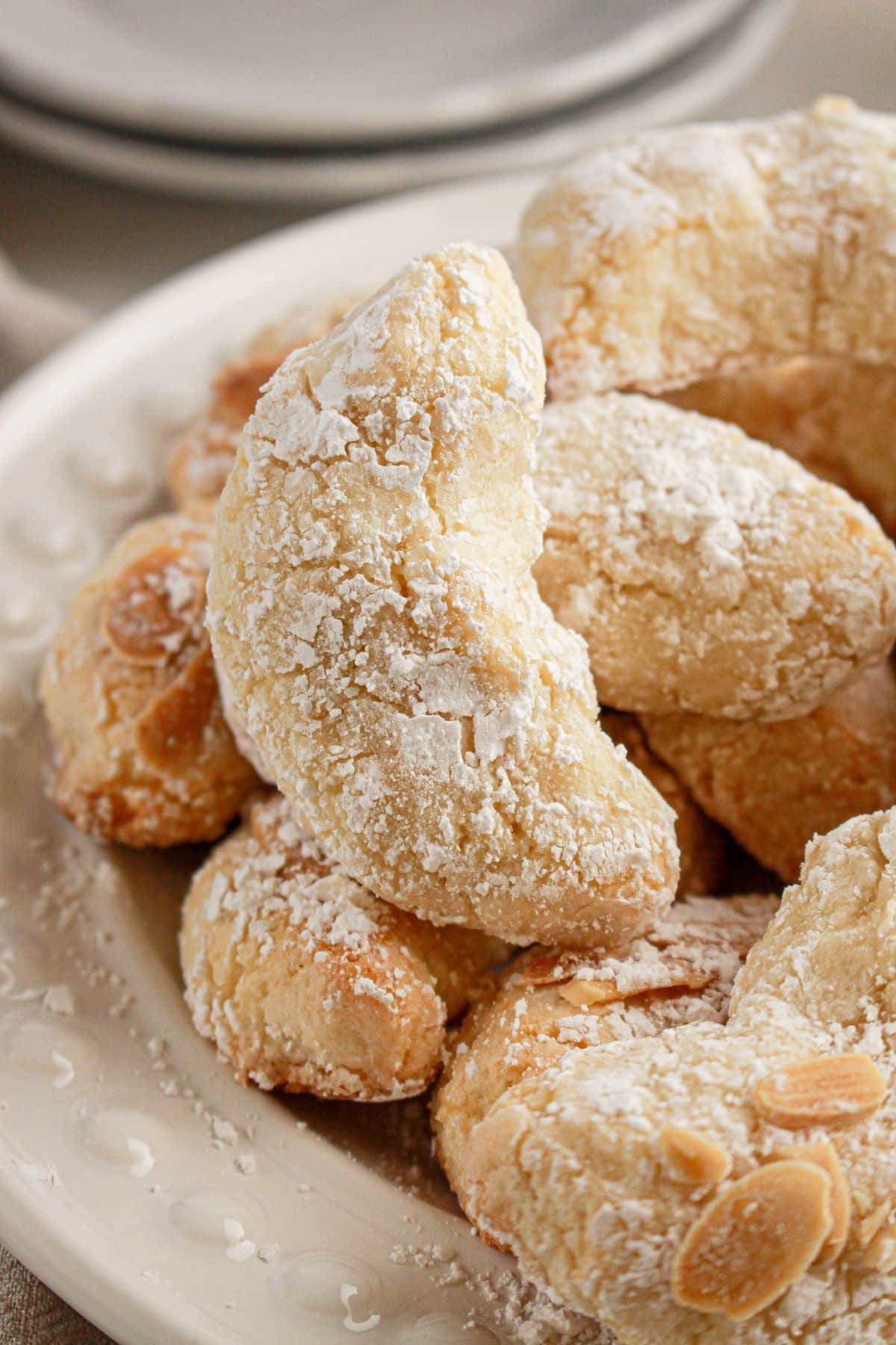 Italian amaretti cookies on a white plate.
