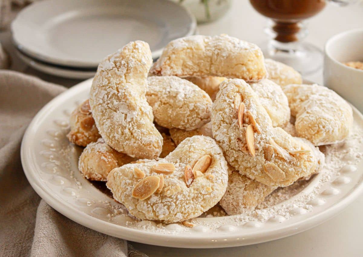 Italian amaretti cookies on a white plate.