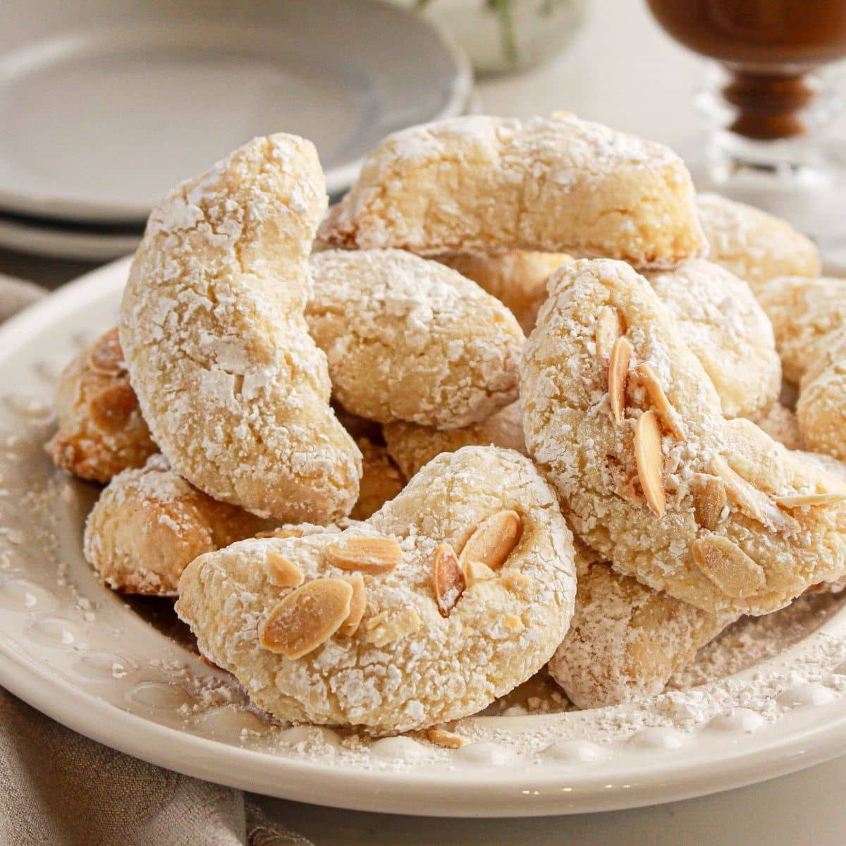 Italian amaretti cookies on a white plate.