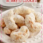 Italian amaretti cookies on a white plate.