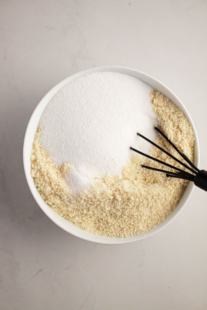 Dry ingredients being mixed together in a bowl.