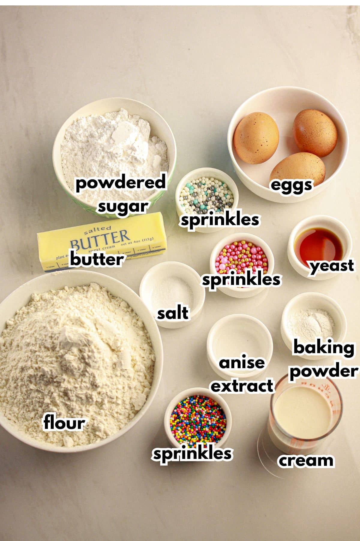 Bowls of ingredients on a counter labelled with text.