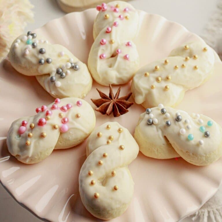 Italian anise cookies on a plate.