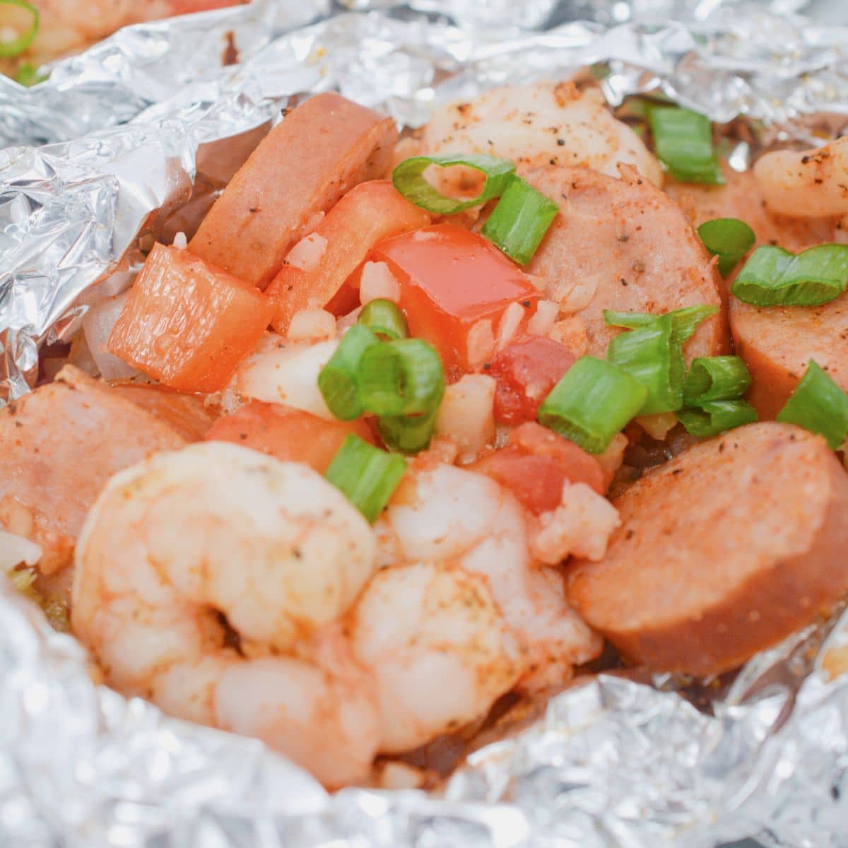 Shrimp and sausage in foil.