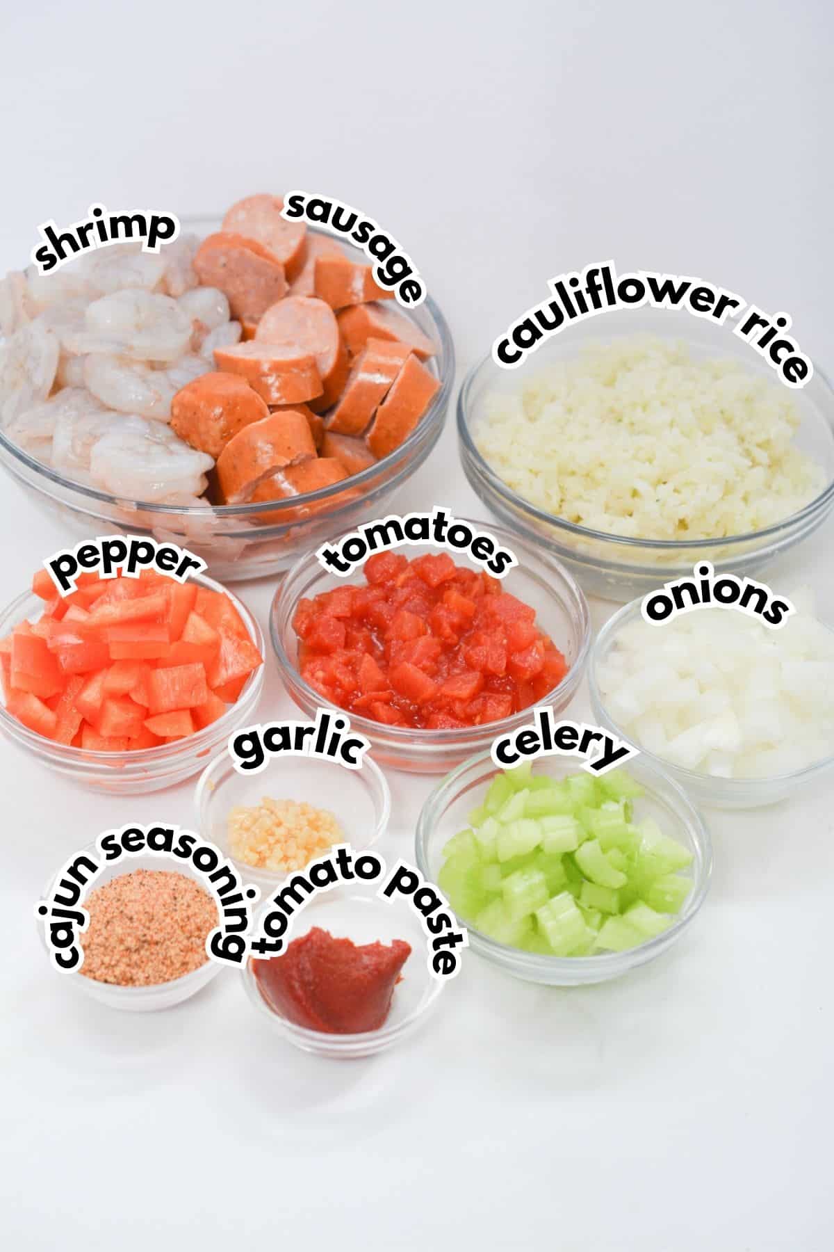 Bowls of ingredients on a counter labelled with text.
