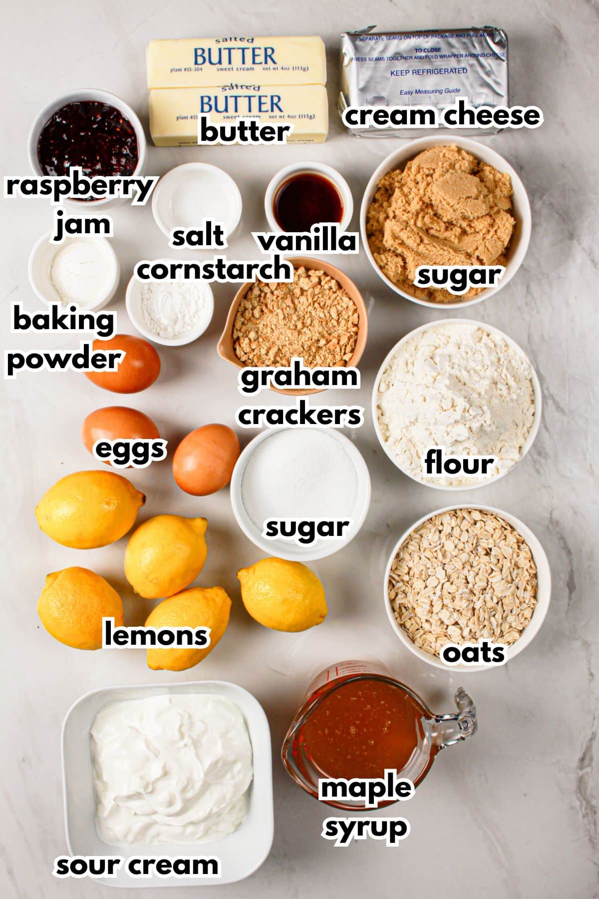 Bowls of ingredients labelled with text on a counter.