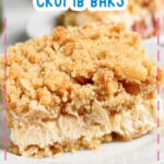 Slice of lemon cheesecake crumb bars on a plate.