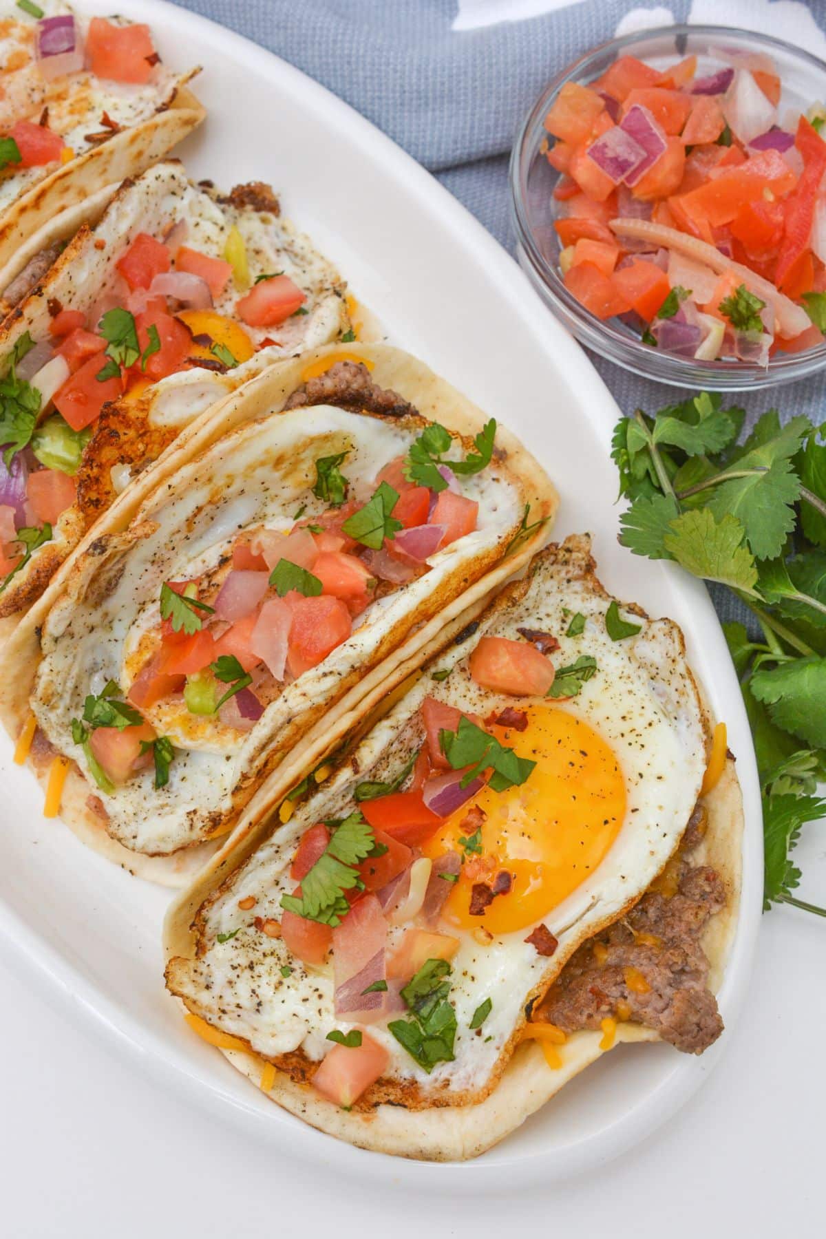 Sausage tacos on a serving platter.