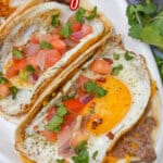 Sausage tacos on a serving platter.