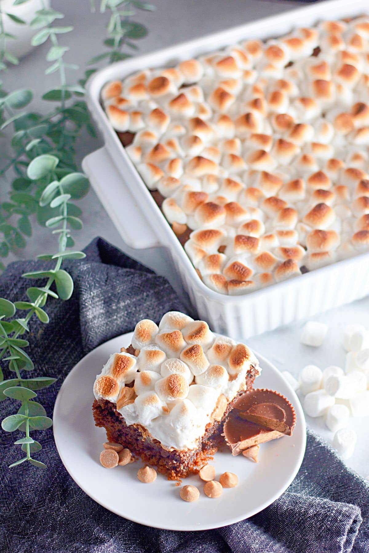 Slice of smores brownies on a plate.