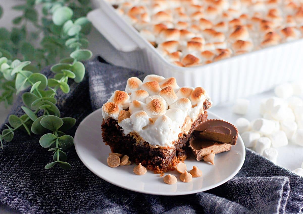 Slice of smores brownies on a plate.