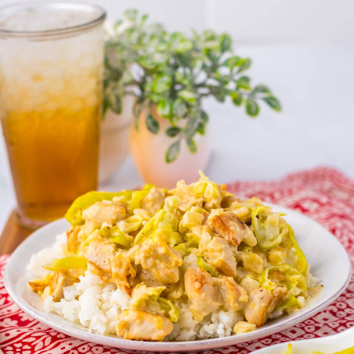 Plate of rice and pepperoncini chicken.
