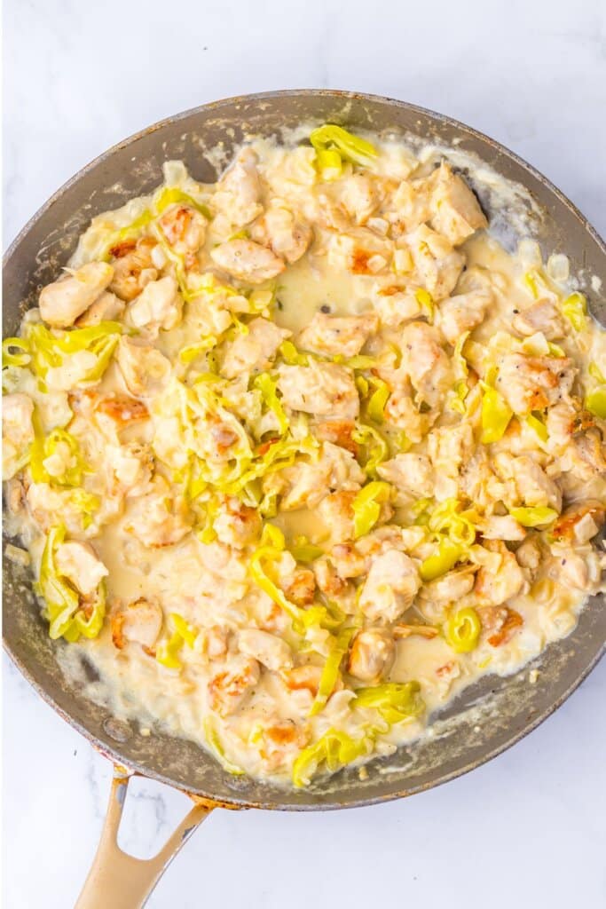 Skillet full of pepperoncini chicken.