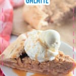 Slice of apple crumb galette on plate.
