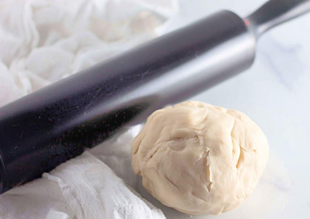Pie crust on a baking sheet.