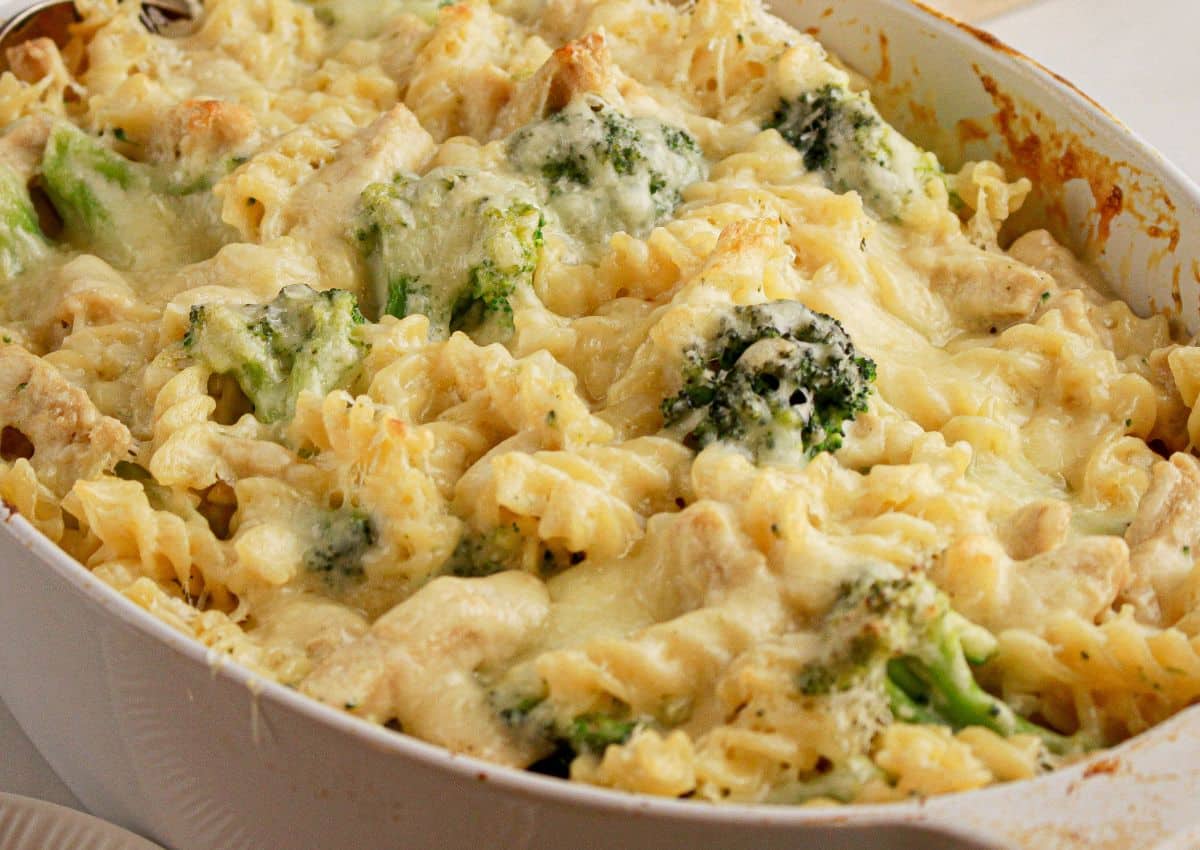 Baking dish full of baked chicken alfredo.