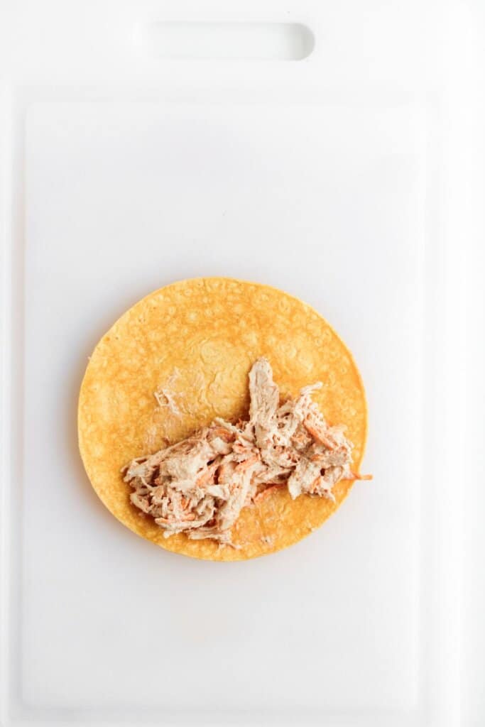 Chicken filling in a tortilla.