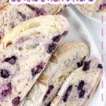 Slices of blueberry sourdough bread on a platter.