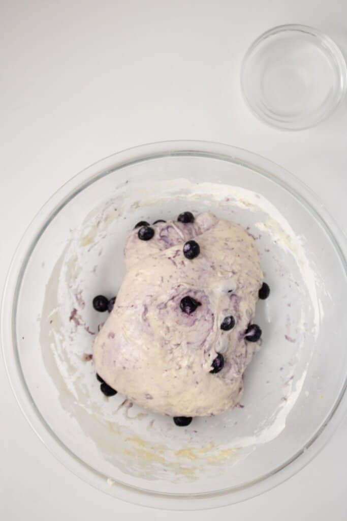 Dough ball in a glass bowl ready for stretch and folds.