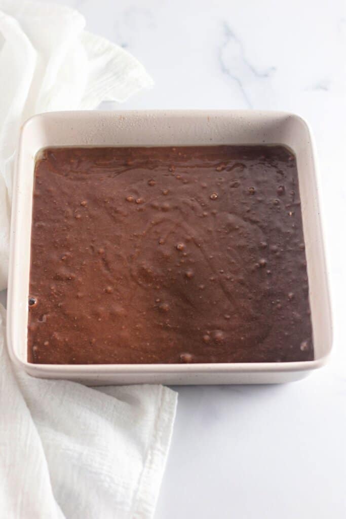 Batter in a metal baking pan.