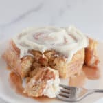 Cinnamon roll on a plate.