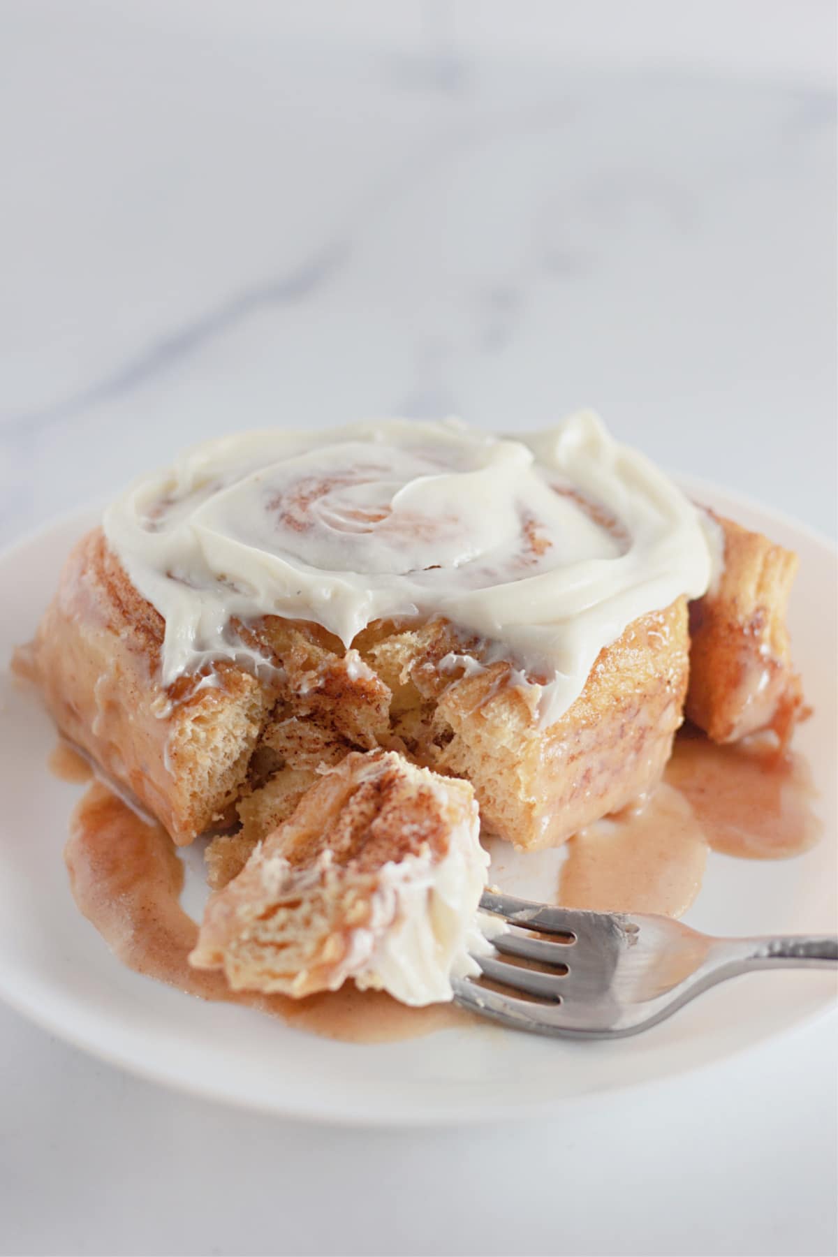 Cinnamon roll on a plate.