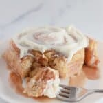 Cinnamon roll on a plate.