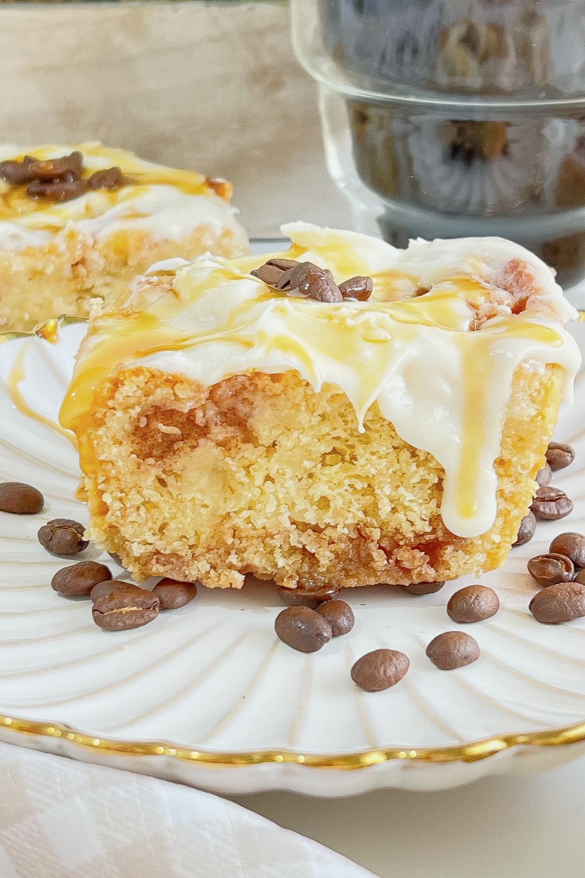 Coffee cinnamon roll on a plate.