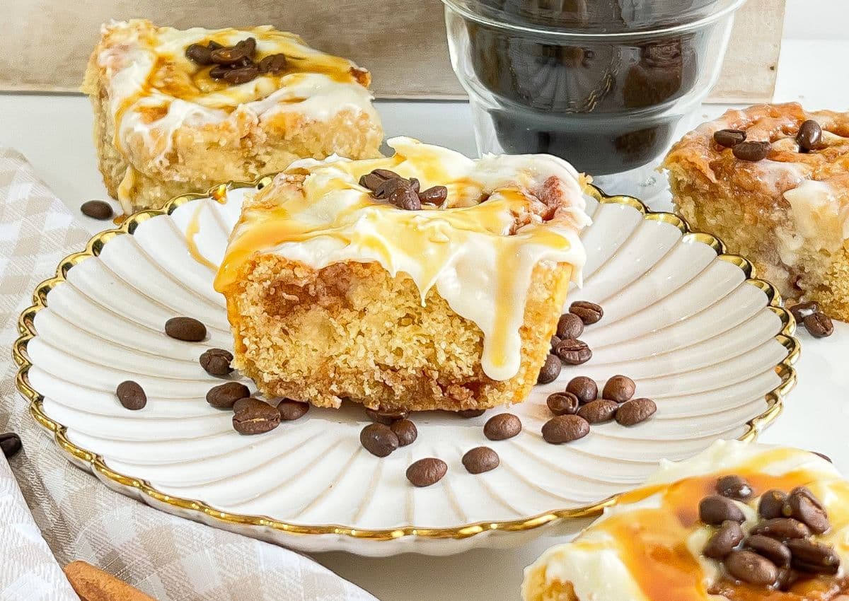 Coffee cinnamon roll on a plate.