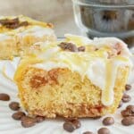 Coffee cinnamon roll on a white plate.