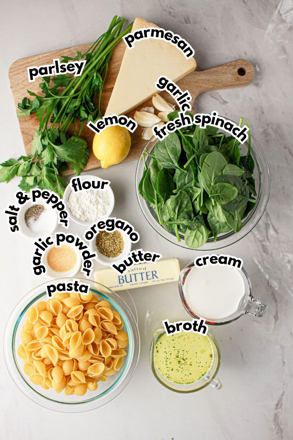Bowls of ingredients labelled with text on a counter.