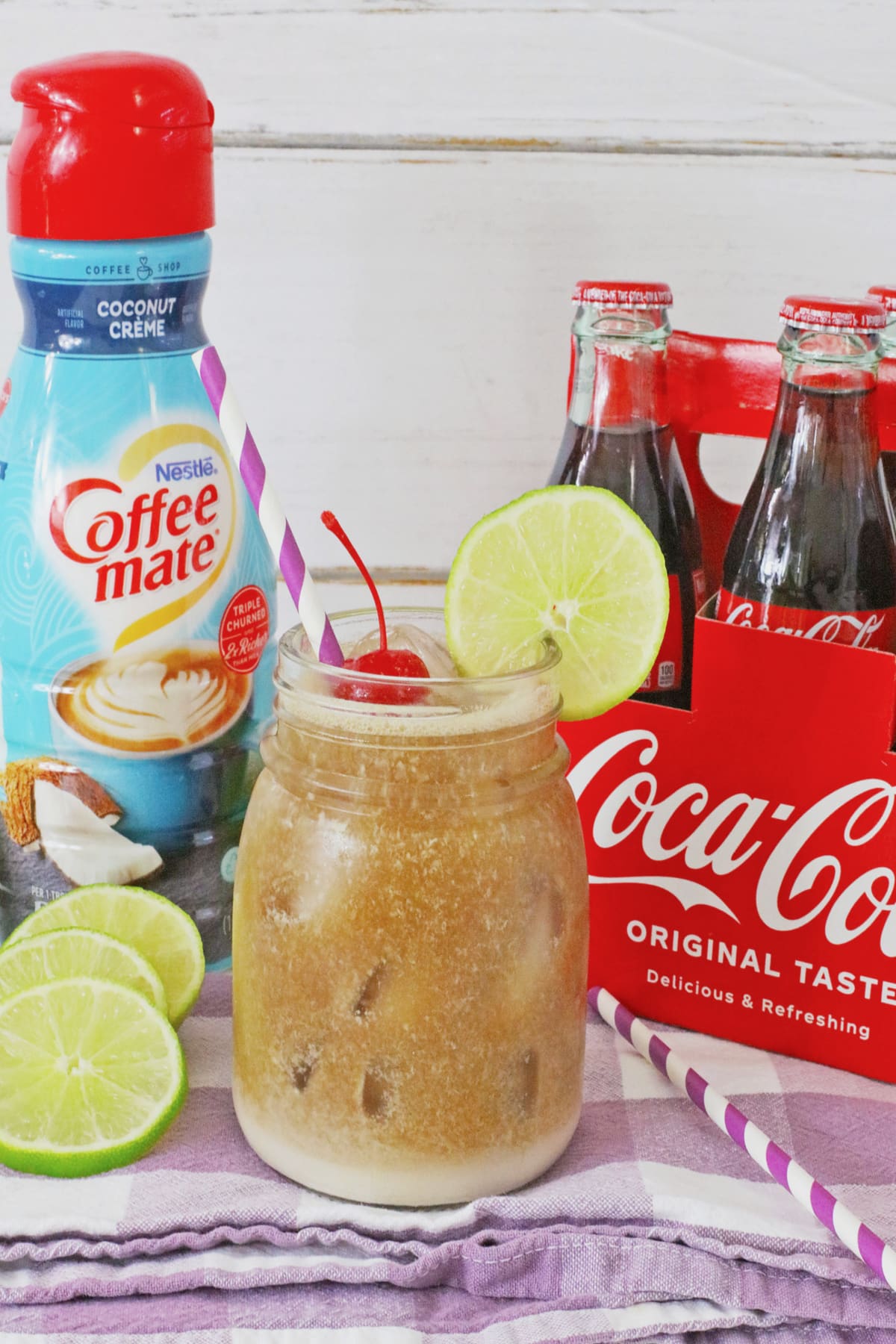 Jar full of dirty coke drink.