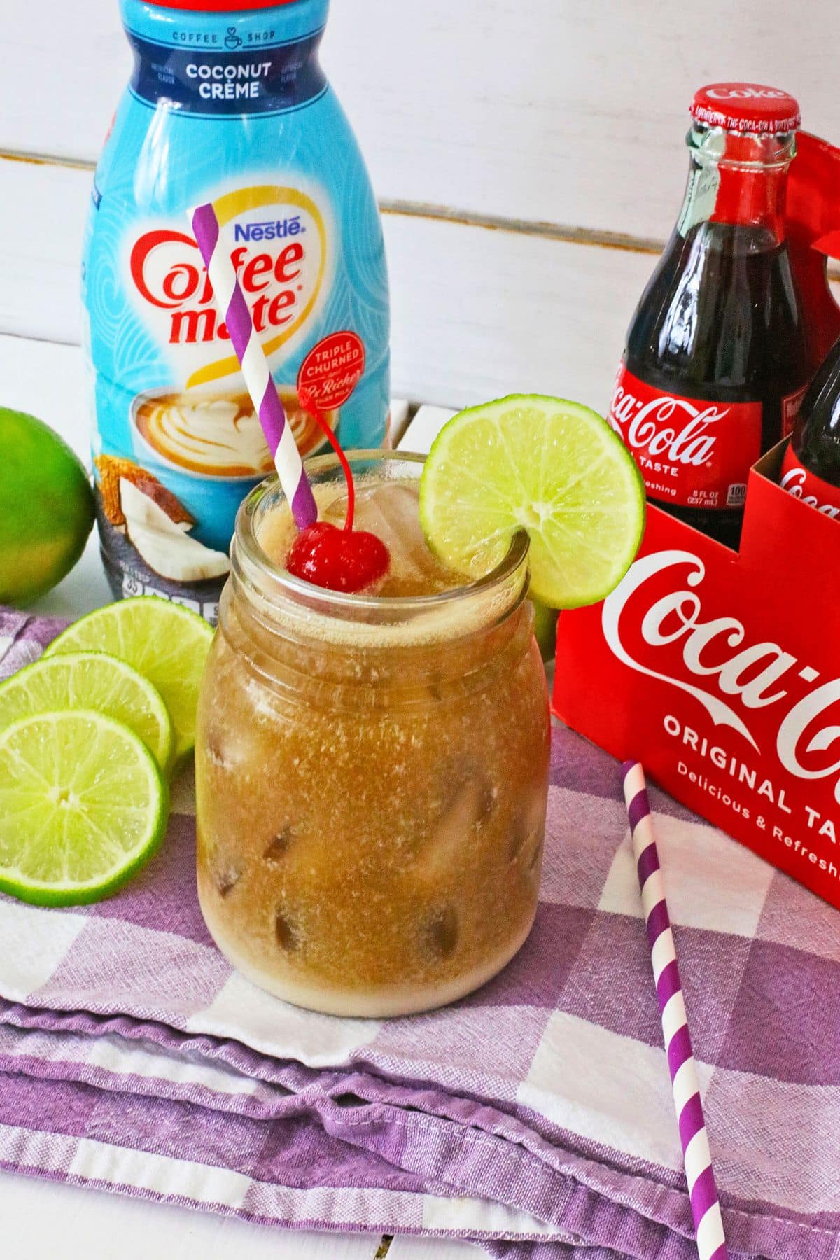 Jar full of dirty coke drink.