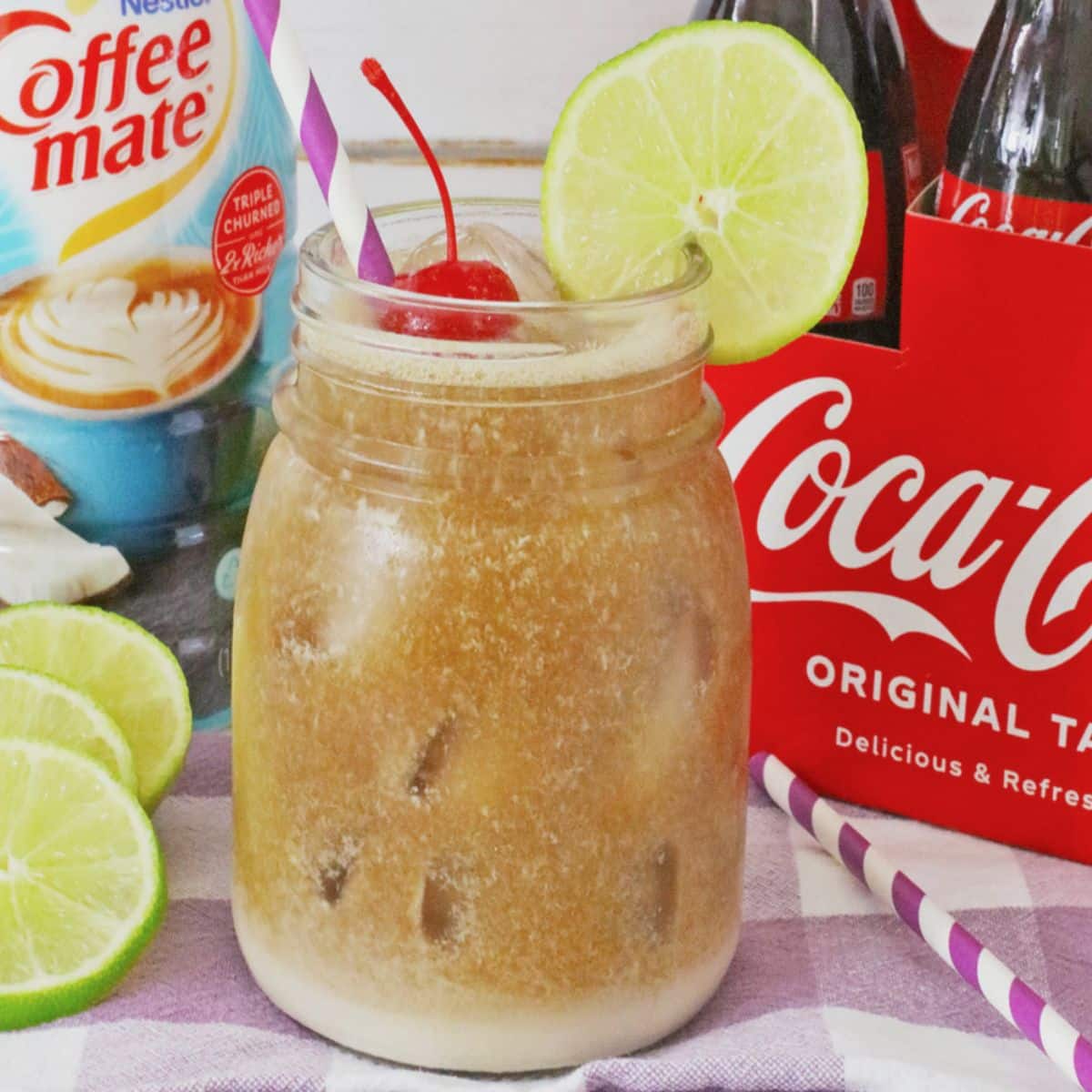 Jar full of dirty coke drink.