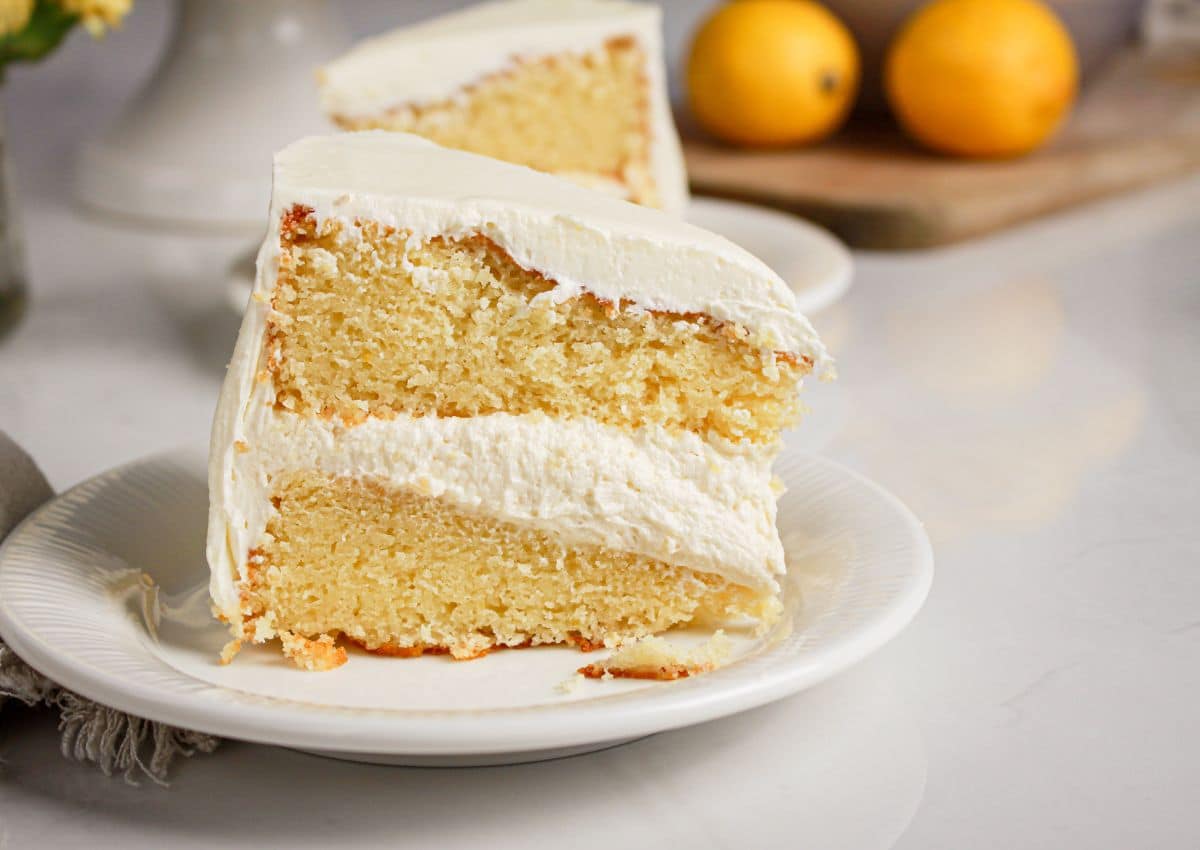 Slice of lemon ding dong cake on a plate.