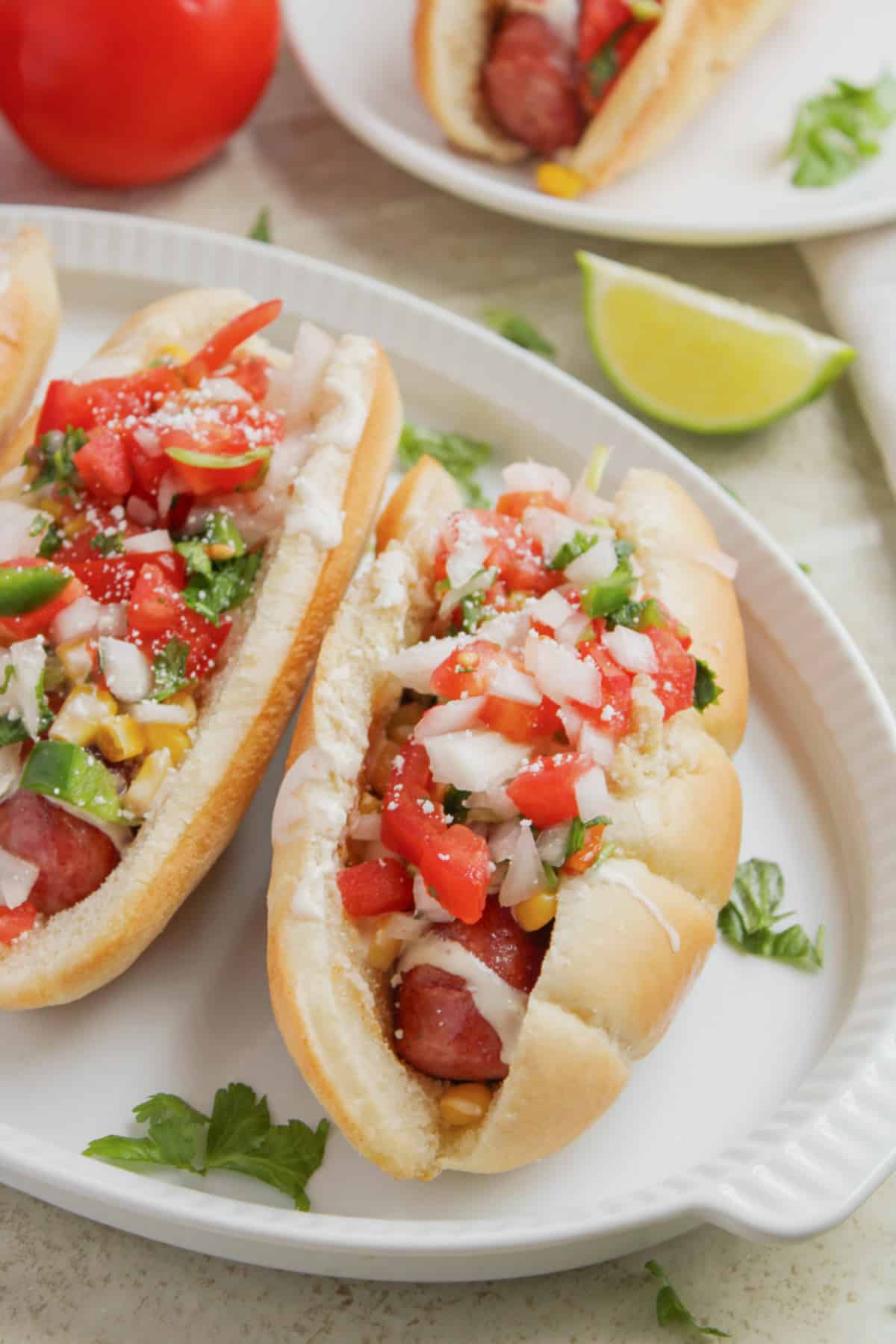 Tex mex sausage dogs on a plate.