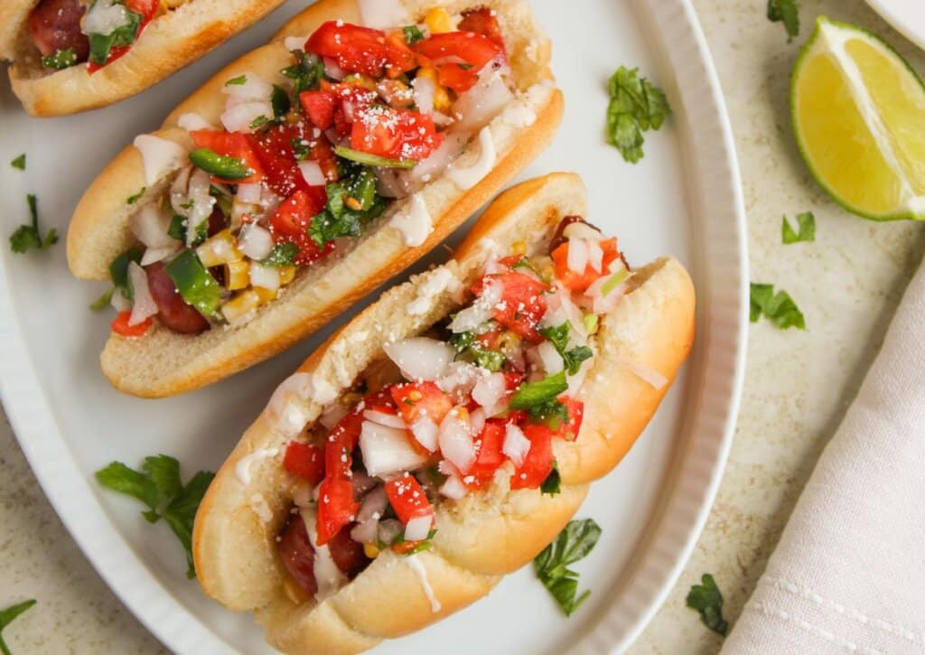 Tex mex sausage dogs on a plate.
