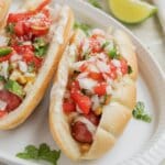 Tex mex sausage dogs on a plate.