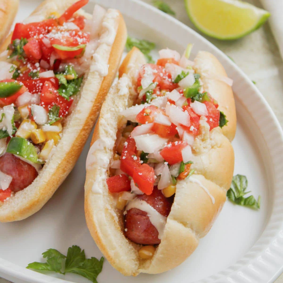 Tex mex sausage dogs on a plate.