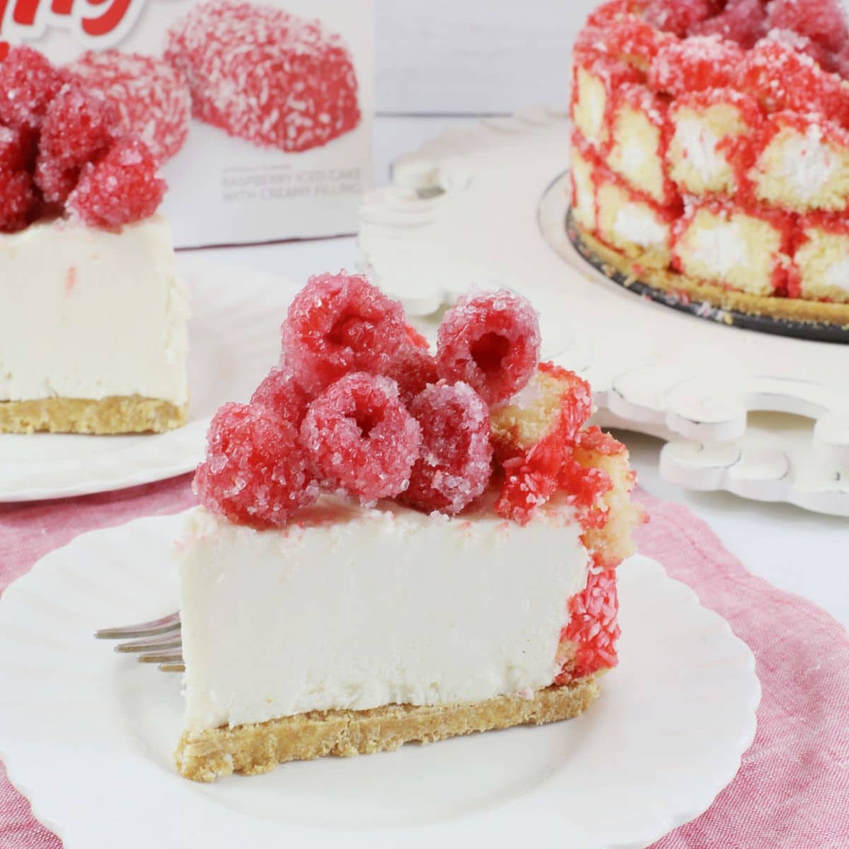 Slice of zinger cheesecake on a plate.