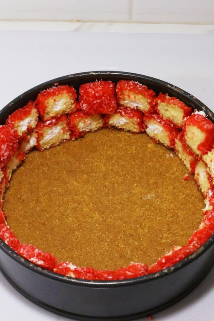 Crust and cakes pressed into pan.