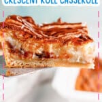 Slice of cheesecake crescent roll on a plate.