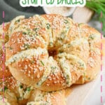 Bagels stacked on a serving platter.