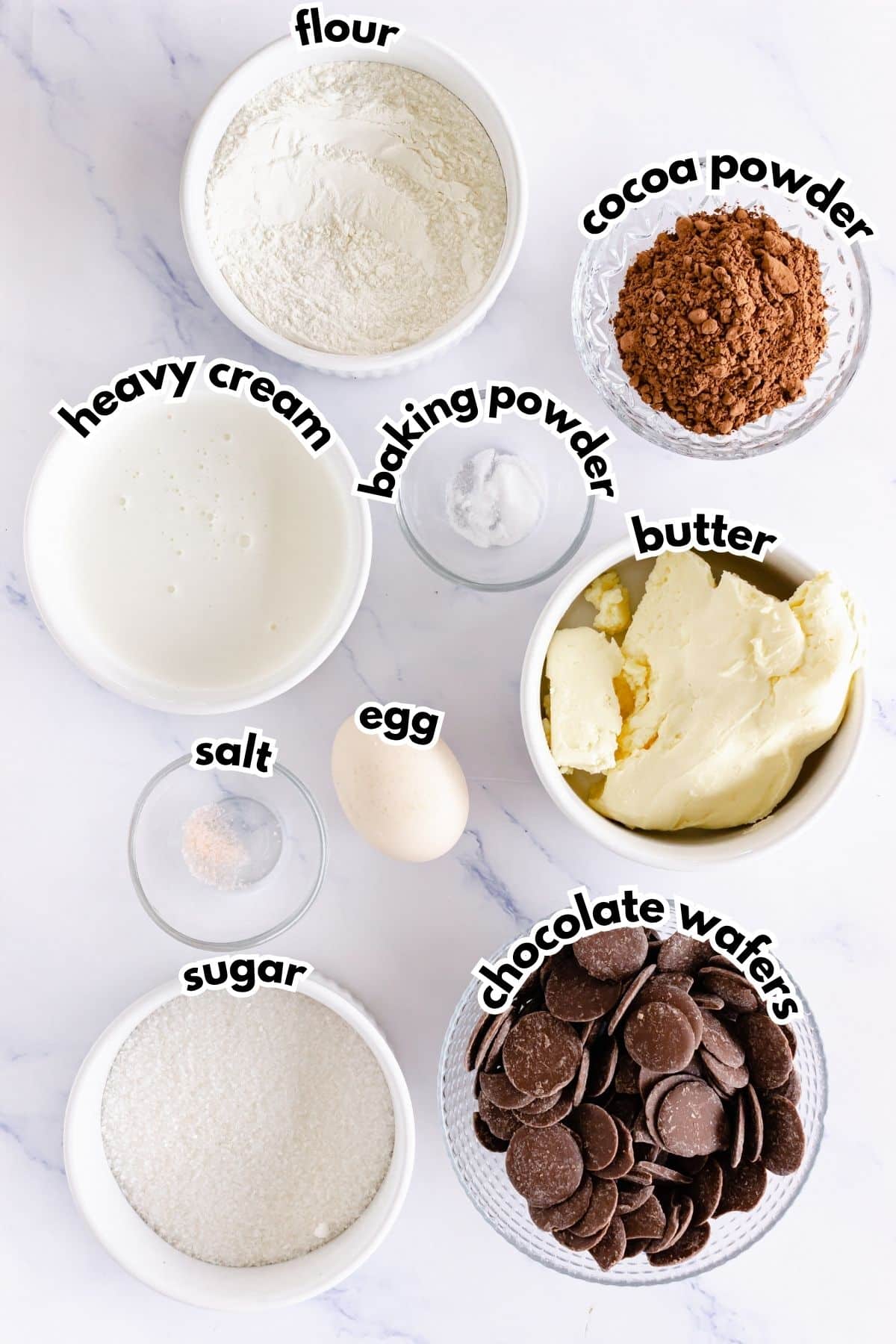 Bowls of ingredients labeled with text.