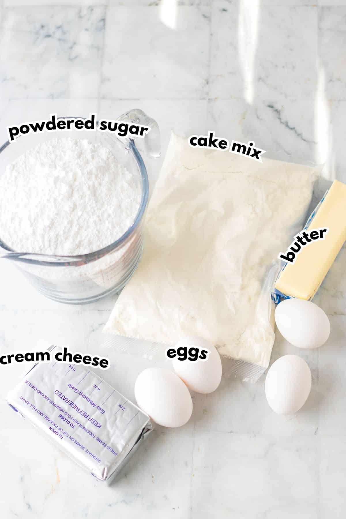 Bowls of ingredients on a counter labeled with text.