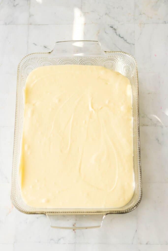 Cream cheese mixture in a baking dish.