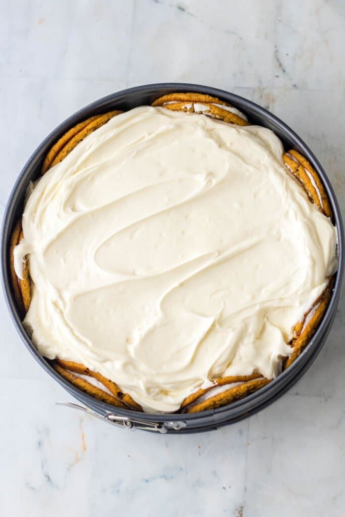 Whole cheesecake in a springform pan.