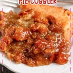 Serving of pecan pie cobbler on a plate.